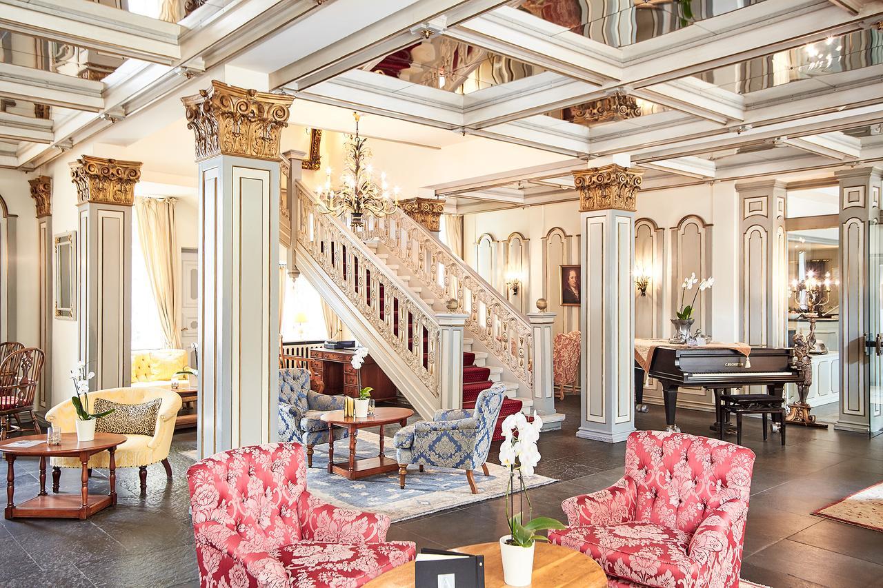 Althoff Hotel Fuerstenhof เซลเลอ ภายนอก รูปภาพ The lobby of the Hotel de la Paix